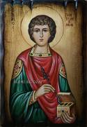 Ръчно рисувана икона на Свети Пантелеймон с лекарски атрибути върху състарена дървена основа.